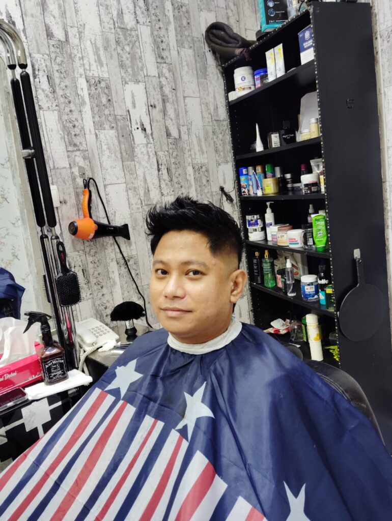At Stylist Hair Salon Al Rigga Dubai, men can sport a chic, spiky hairstyle with skin fade.