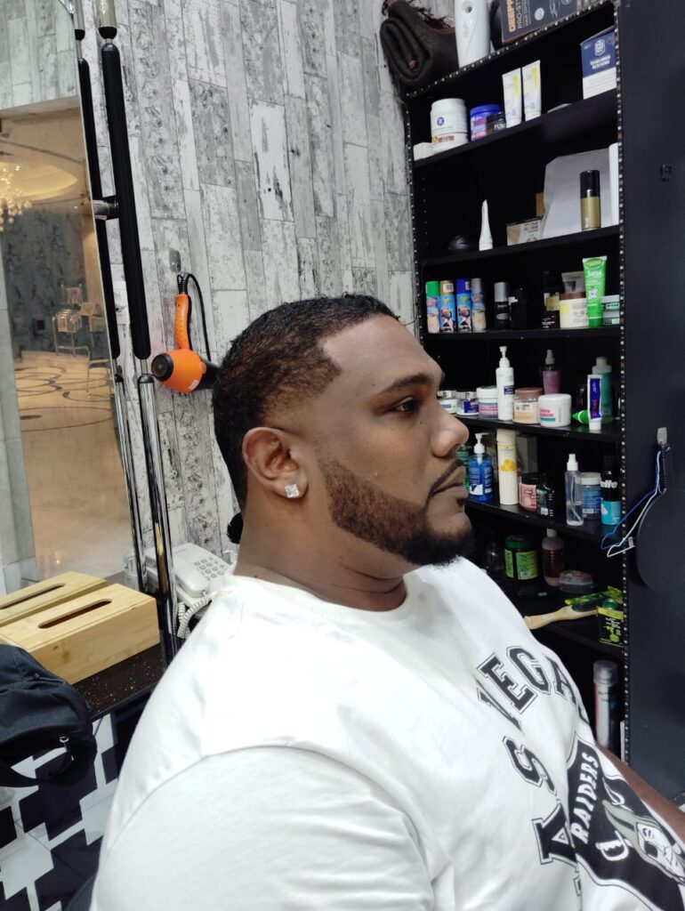 At Stylist Hair Salon Al Rigga Dubai, men can sport a chic, spiky hairstyle with skin fade.
