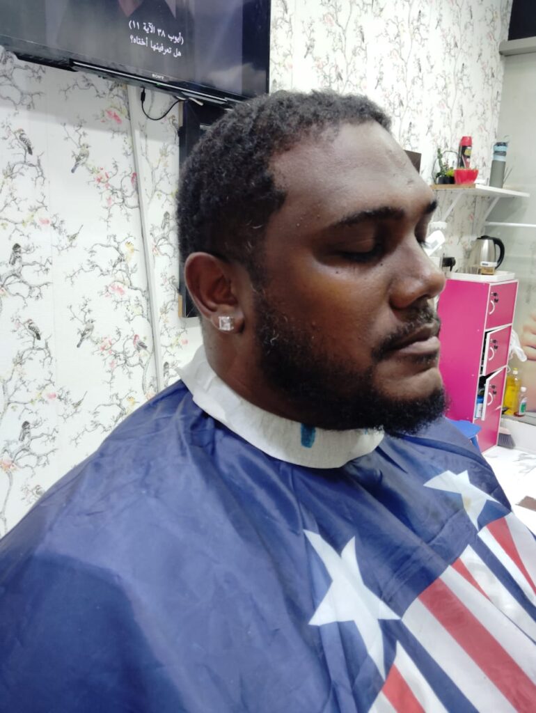 Men’s hairstyle before professional haircut at Stylist Hair Salon Al Rigga Dubai.